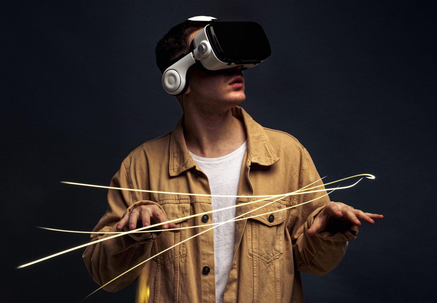 young-man-wearing-virtual-reality-goggles-with-special-effects young-man-wearing-virtual-reality-goggles-with-special-effects